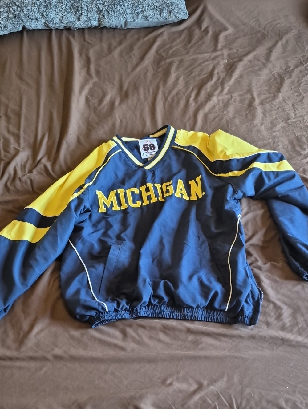 Michigan Men's Navy and Yellow Performance Pullover Jacket
